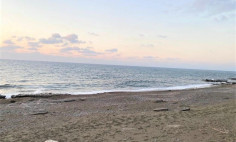Sea front land with building permit , Paphos