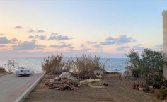 Sea front land with building permit , Paphos
