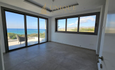 Beachfront villa for sale in Chloraka Paphos next to sandy beach 