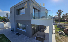 Beachfront villa for sale in Chloraka Paphos next to sandy beach 