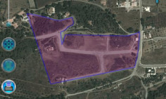 A corner plot for sale in Pyrga in an area with trees and mountain views , Larnaca