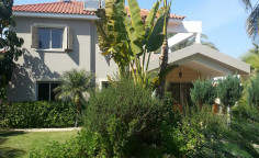 A beautiful detached villa with mature garden 2nd line from the beach in Meneou for sale! 