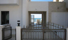 Four bedroom detached fully furnished villa first line on the beach,at 