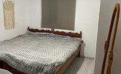 Partially furnished two bedroom apartment in vibrant area 