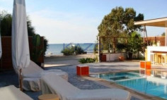 First line three bedroom sea front home with pool 