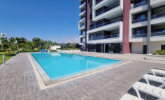 Large 3 bedroom furnished apartment with swimming pool for sale in Mouttagiaka