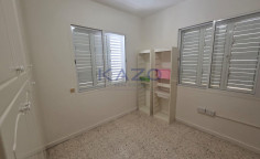 Spacious three bedroom upper floor apartment in central Omonoia 