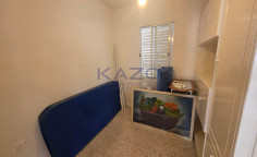 Spacious three bedroom upper floor apartment in central Omonoia 