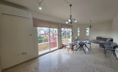 Spacious three bedroom upper floor apartment in central Omonoia 