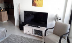 Modern well sized two bedroom apartment for sale with communal pool in Tersefanou 