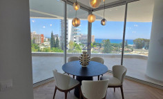 Modern seafront apartment with gym in Mouttagiaka 