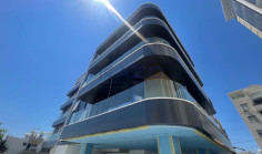 Brand new modern commercial building with rooftop 