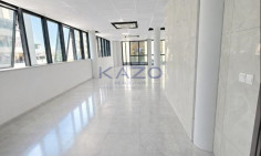 Brand new modern commercial building with rooftop 