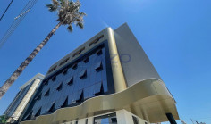 Brand new modern commercial building with rooftop 