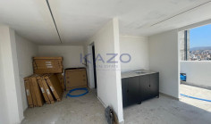 Brand new modern commercial building with rooftop 