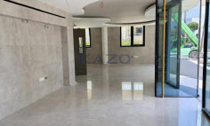 Brand new modern commercial building with rooftop 