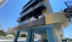 Brand new modern commercial building with rooftop 