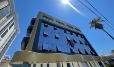 Brand new modern commercial building with rooftop 