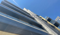 Brand new modern commercial building with rooftop 