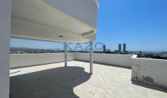 Brand new modern commercial building with rooftop 
