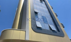 Brand new modern commercial building with rooftop 