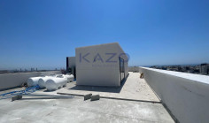 Brand new modern commercial building with rooftop 