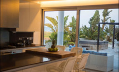 For sale two beachfront plots of land with houses in Larnaca 