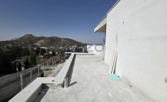 Top floor 3 + 1 bedroom apartment with a private roof garden in Fasoula 