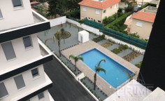 Three bedroom apartment with swimming pool for sale in Agios Tychonas