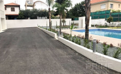Three bedroom apartment with swimming pool for sale in Agios Tychonas