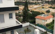 Three bedroom apartment with swimming pool for sale in Agios Tychonas