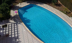 A four bedroom detached house for sale just off Dekelia road with private swimming pool and comes with title deeds