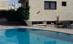 A four bedroom detached house for sale just off Dekelia road with private swimming pool and comes with title deeds